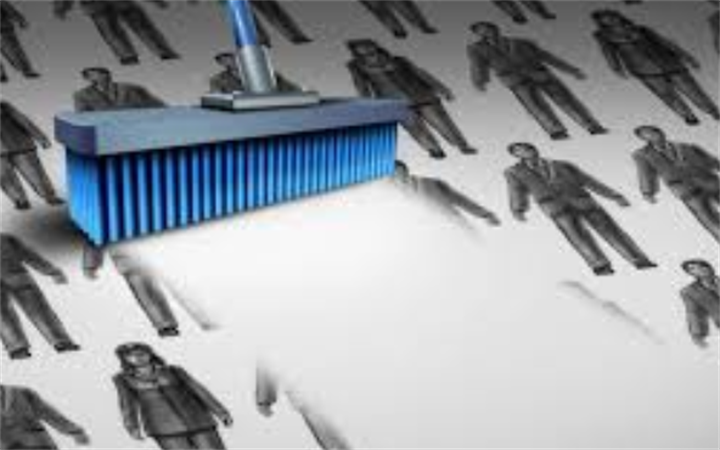 Conceptual graphic of a large broom sweeping away silhouetted office workers, visualizing mass job contraction and layoffs