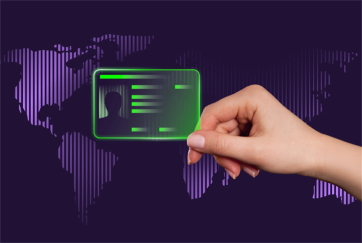 Hand holding a glowing digital identity card against a world map background