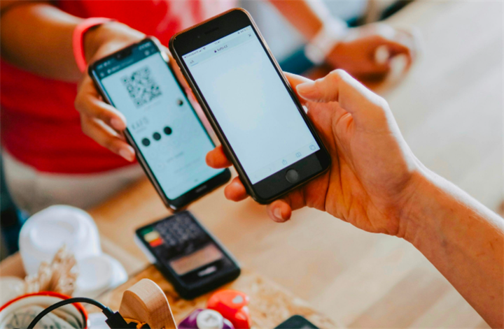 Peer-to-peer mobile payment transaction using QR codes between two users