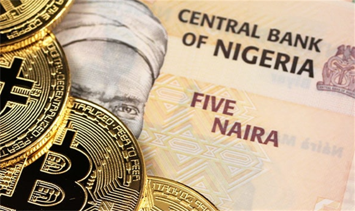 Nigerian five naira banknote laid beside Bitcoin coins, contrasting eNaira CBDC and private crypto assets